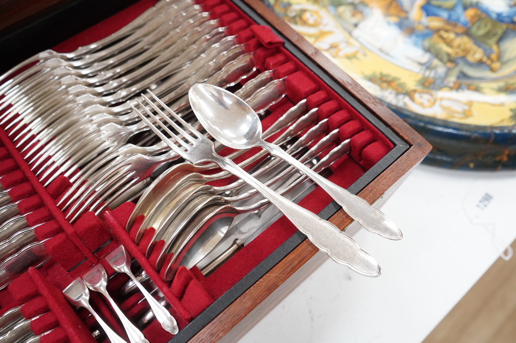 An oak cased, near complete, comprehensive canteen of plated cutlery together with odd cutlery from other sets.